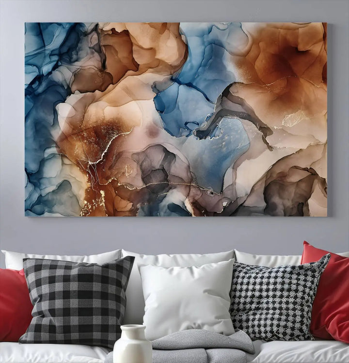 The "Colorful Abstract Clouds Canvas Wall Art Print," featuring an earthy and blue-toned color palette, hangs against a dark wall.