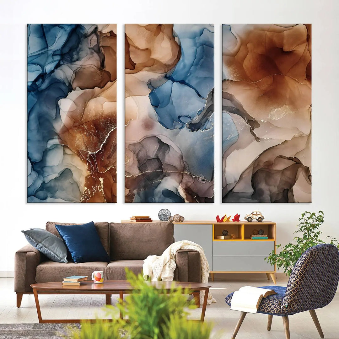 The "Colorful Abstract Clouds Canvas Wall Art Print," featuring an earthy and blue-toned color palette, hangs against a dark wall.