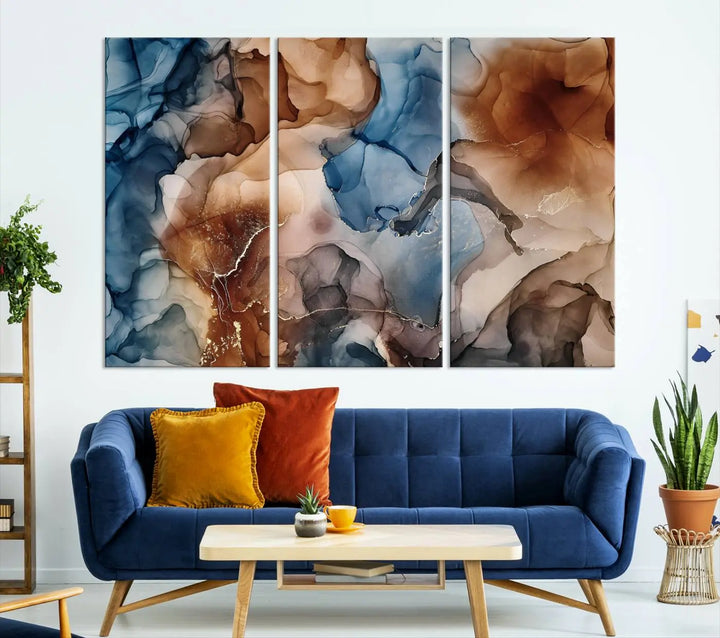 The "Colorful Abstract Clouds Canvas Wall Art Print," featuring an earthy and blue-toned color palette, hangs against a dark wall.