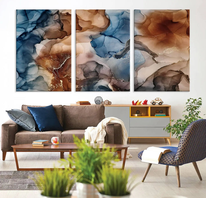 The "Colorful Abstract Clouds Canvas Wall Art Print," featuring an earthy and blue-toned color palette, hangs against a dark wall.