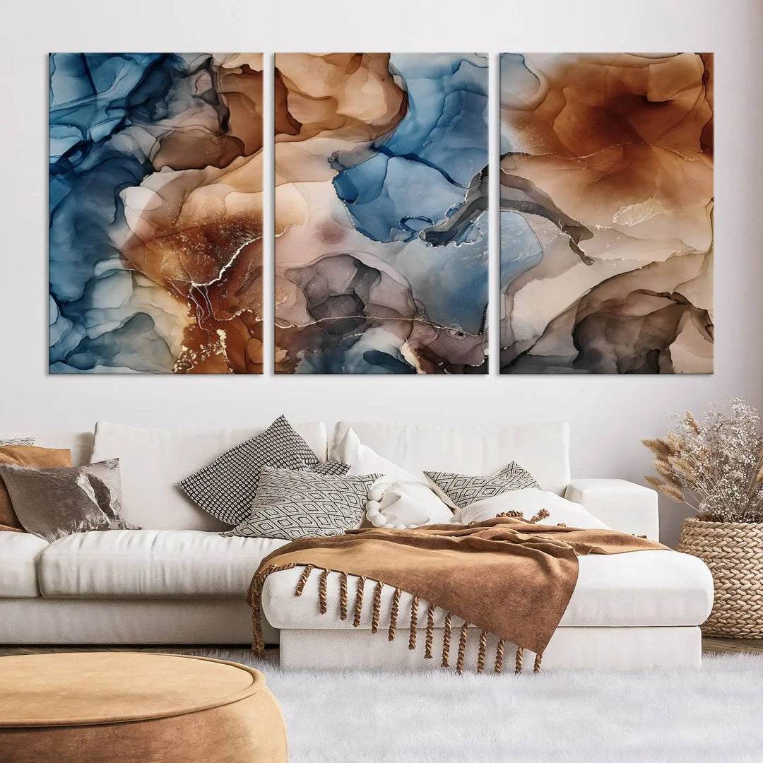 The "Colorful Abstract Clouds Canvas Wall Art Print," featuring an earthy and blue-toned color palette, hangs against a dark wall.