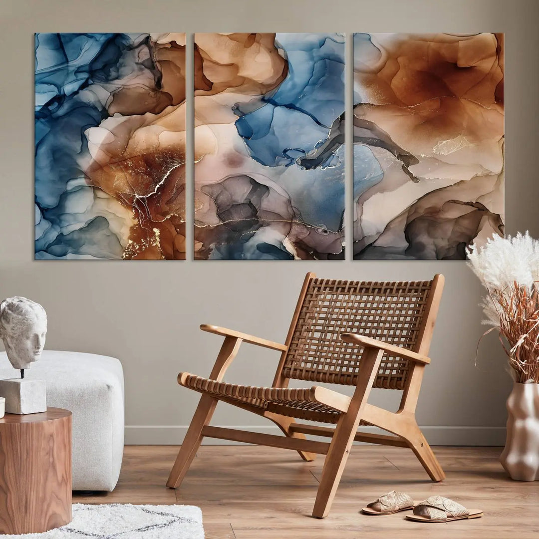 The "Colorful Abstract Clouds Canvas Wall Art Print," featuring an earthy and blue-toned color palette, hangs against a dark wall.