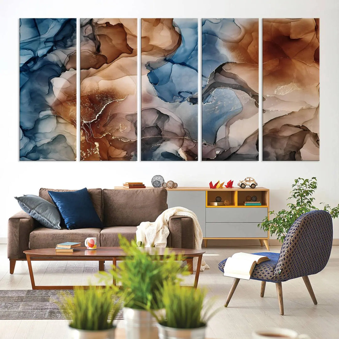 The "Colorful Abstract Clouds Canvas Wall Art Print," featuring an earthy and blue-toned color palette, hangs against a dark wall.