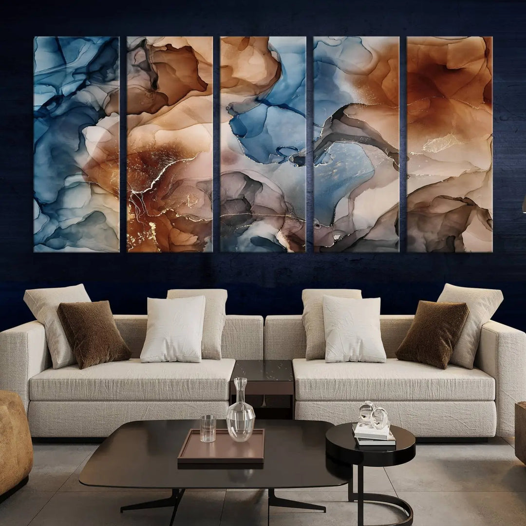 The "Colorful Abstract Clouds Canvas Wall Art Print," featuring an earthy and blue-toned color palette, hangs against a dark wall.