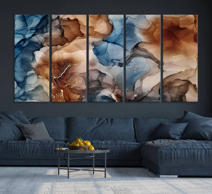 The "Colorful Abstract Clouds Canvas Wall Art Print," featuring an earthy and blue-toned color palette, hangs against a dark wall.