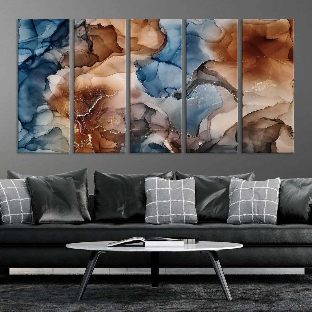 The "Colorful Abstract Clouds Canvas Wall Art Print," featuring an earthy and blue-toned color palette, hangs against a dark wall.