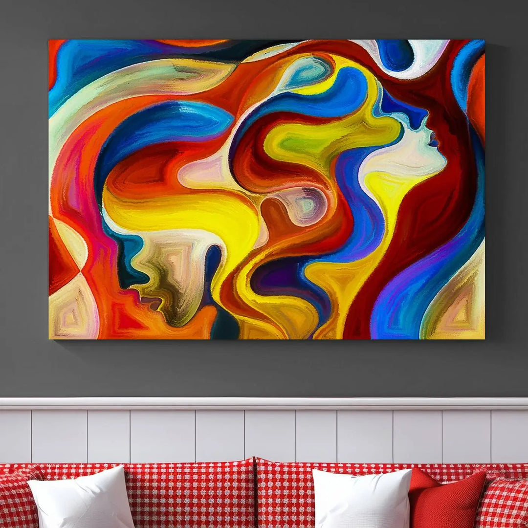 The Colorful Abstract Human Figure Wall Art Canvas Print, featuring overlapping human profiles on museum-quality canvas, is exhibited as a triptych.