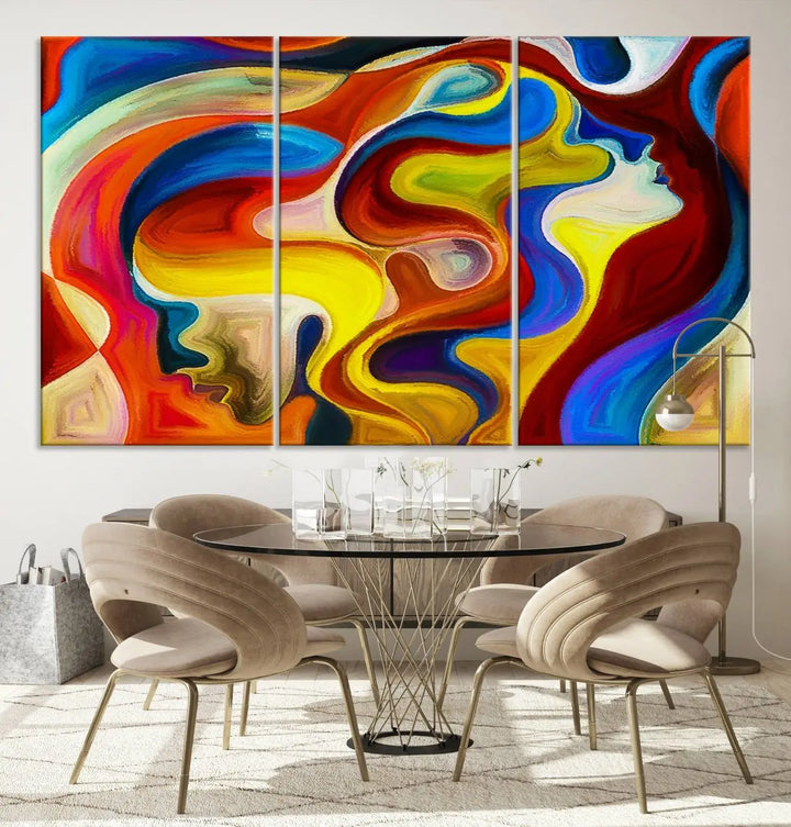 The Colorful Abstract Human Figure Wall Art Canvas Print, featuring overlapping human profiles on museum-quality canvas, is exhibited as a triptych.