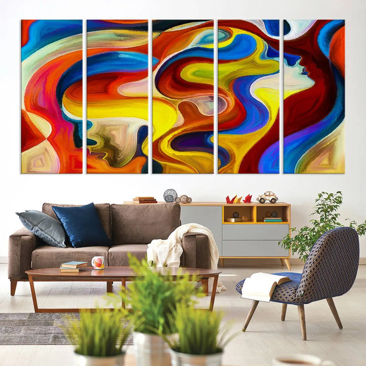 The Colorful Abstract Human Figure Wall Art Canvas Print, featuring overlapping human profiles on museum-quality canvas, is exhibited as a triptych.