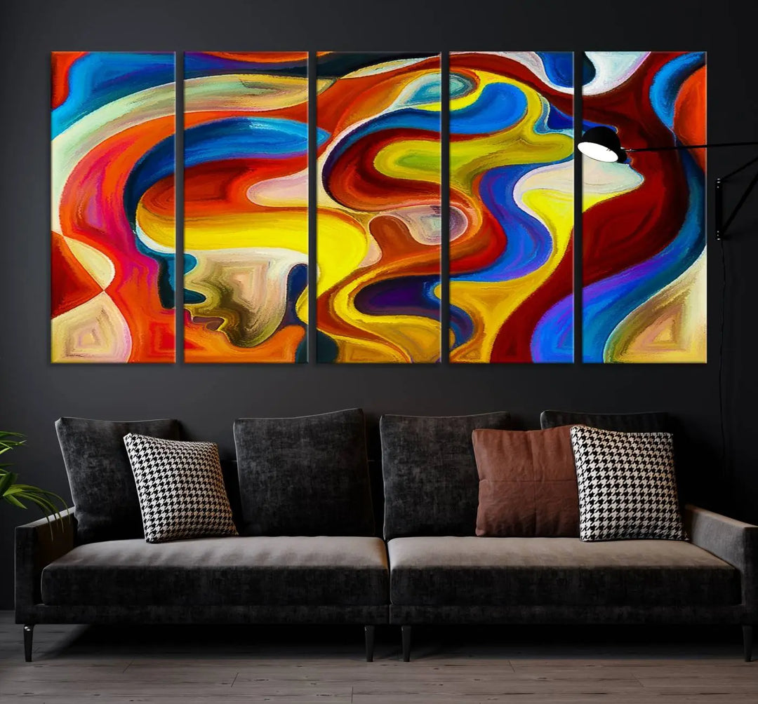 The Colorful Abstract Human Figure Wall Art Canvas Print, featuring overlapping human profiles on museum-quality canvas, is exhibited as a triptych.