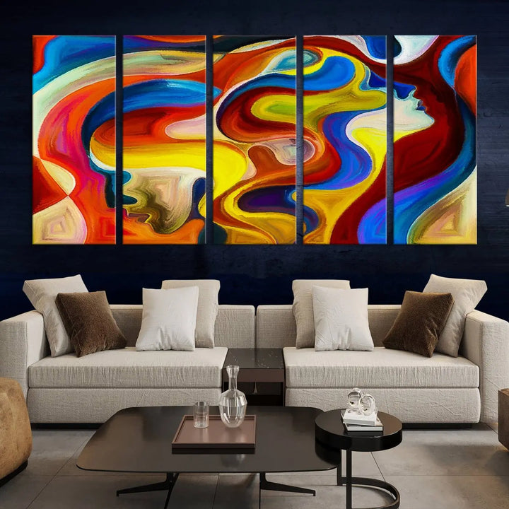 The Colorful Abstract Human Figure Wall Art Canvas Print, featuring overlapping human profiles on museum-quality canvas, is exhibited as a triptych.