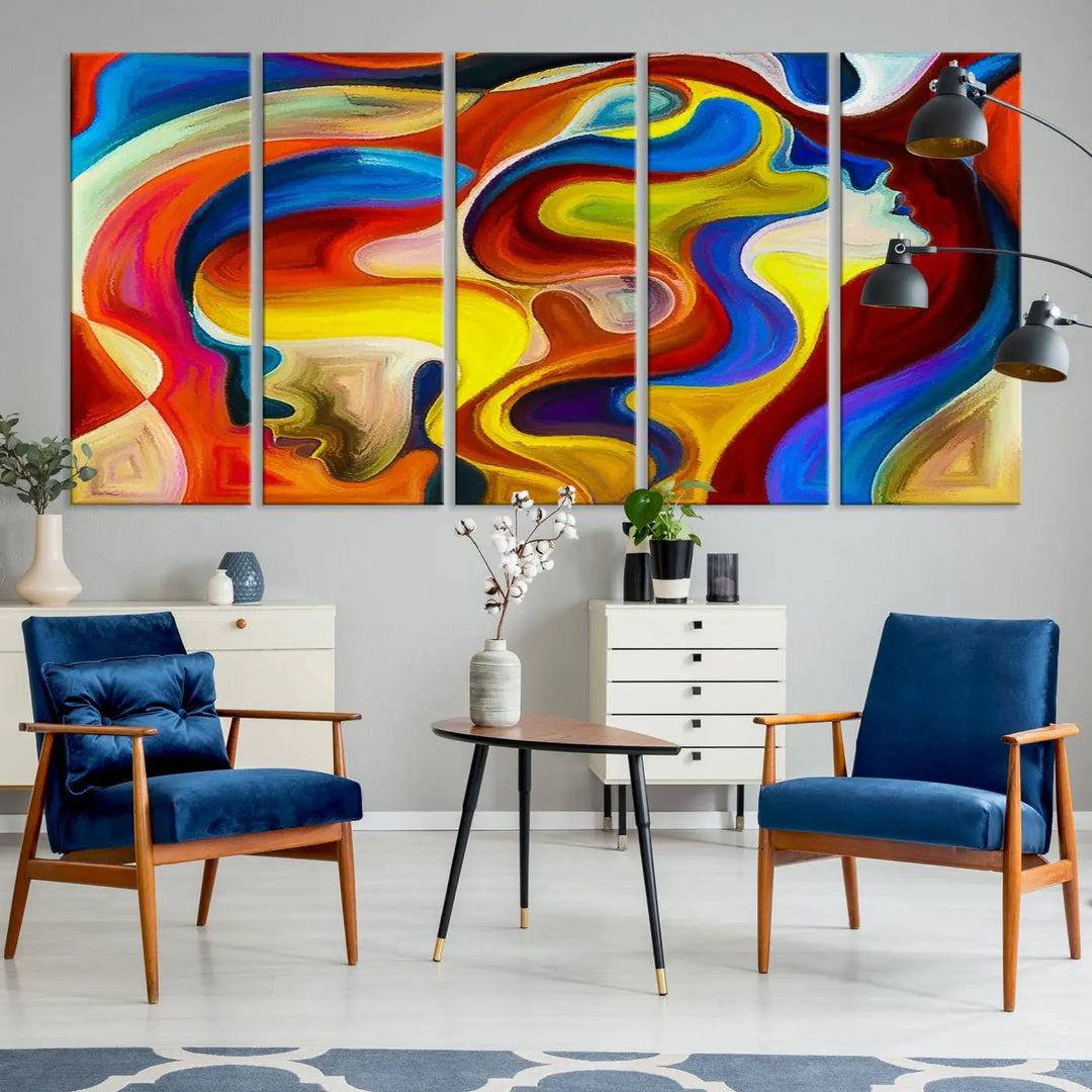 The Colorful Abstract Human Figure Wall Art Canvas Print, featuring overlapping human profiles on museum-quality canvas, is exhibited as a triptych.