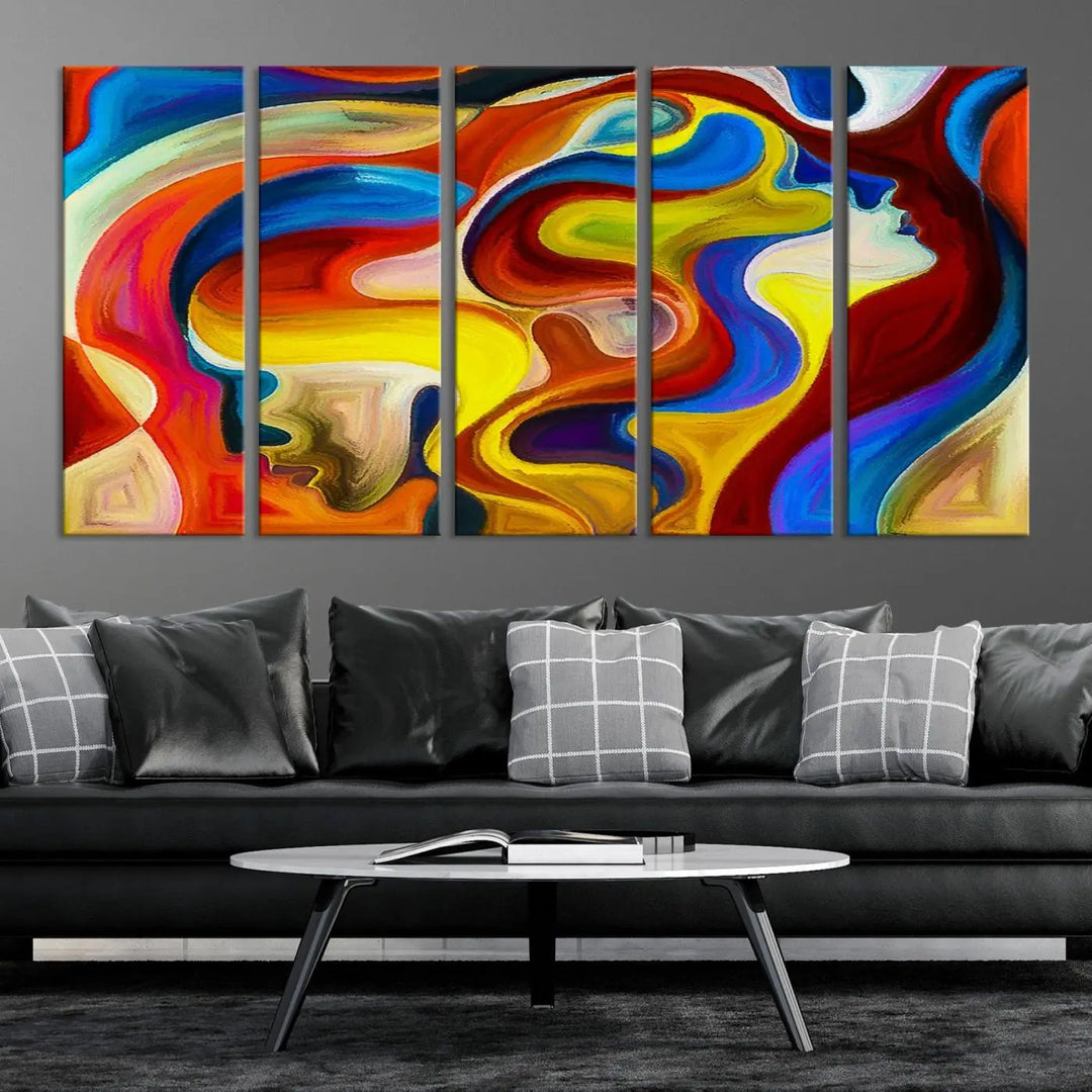 The Colorful Abstract Human Figure Wall Art Canvas Print, featuring overlapping human profiles on museum-quality canvas, is exhibited as a triptych.