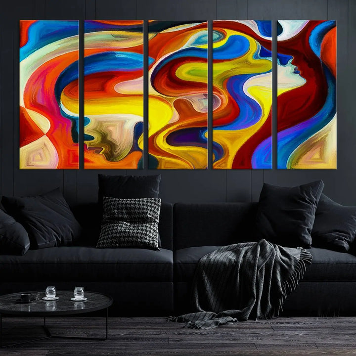 The Colorful Abstract Human Figure Wall Art Canvas Print, featuring overlapping human profiles on museum-quality canvas, is exhibited as a triptych.