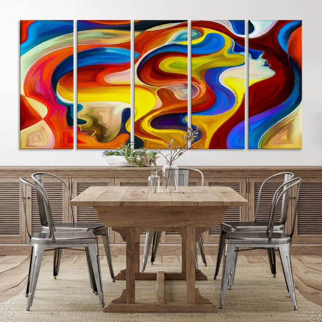 The Colorful Abstract Human Figure Wall Art Canvas Print, featuring overlapping human profiles on museum-quality canvas, is exhibited as a triptych.