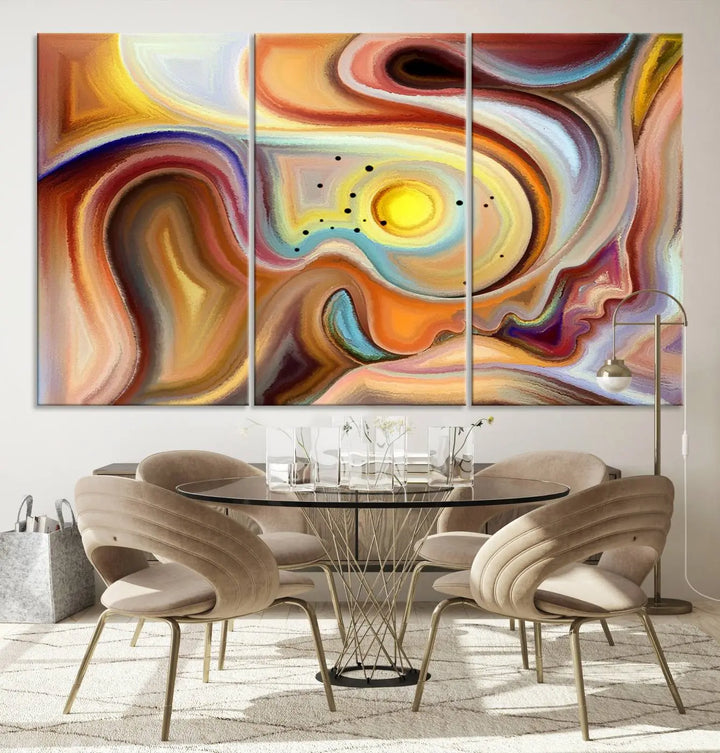 The "Colorful Abstract Human Figures Wall Art Canvas Print" features a triptych design with swirling colors in yellow, brown, and orange tones on gallery-wrapped, museum-quality canvases.