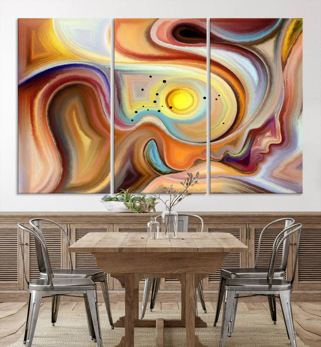 The "Colorful Abstract Human Figures Wall Art Canvas Print" features a triptych design with swirling colors in yellow, brown, and orange tones on gallery-wrapped, museum-quality canvases.