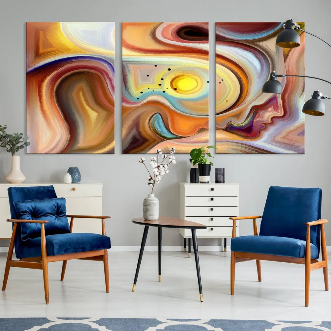 The "Colorful Abstract Human Figures Wall Art Canvas Print" features a triptych design with swirling colors in yellow, brown, and orange tones on gallery-wrapped, museum-quality canvases.