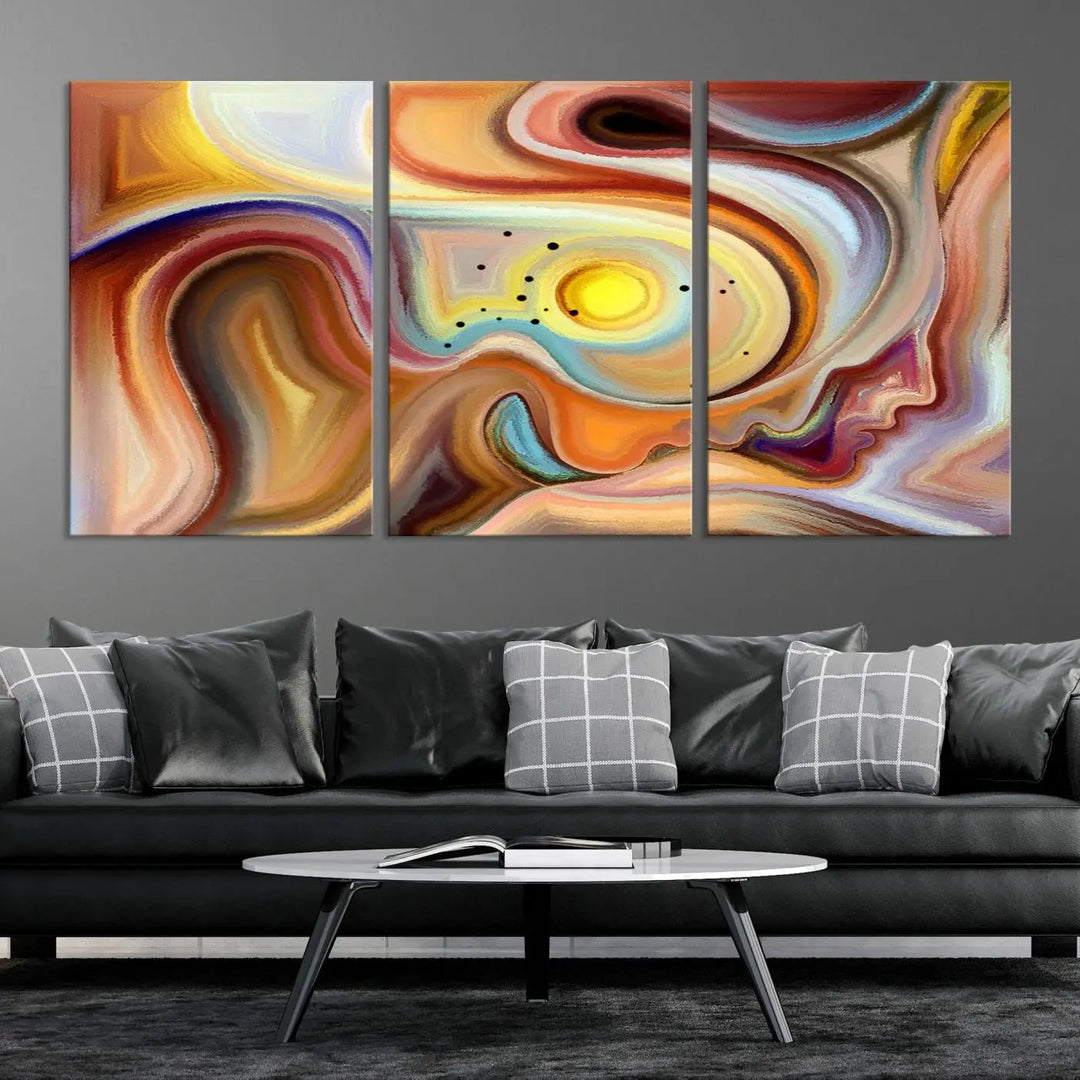 The "Colorful Abstract Human Figures Wall Art Canvas Print" features a triptych design with swirling colors in yellow, brown, and orange tones on gallery-wrapped, museum-quality canvases.