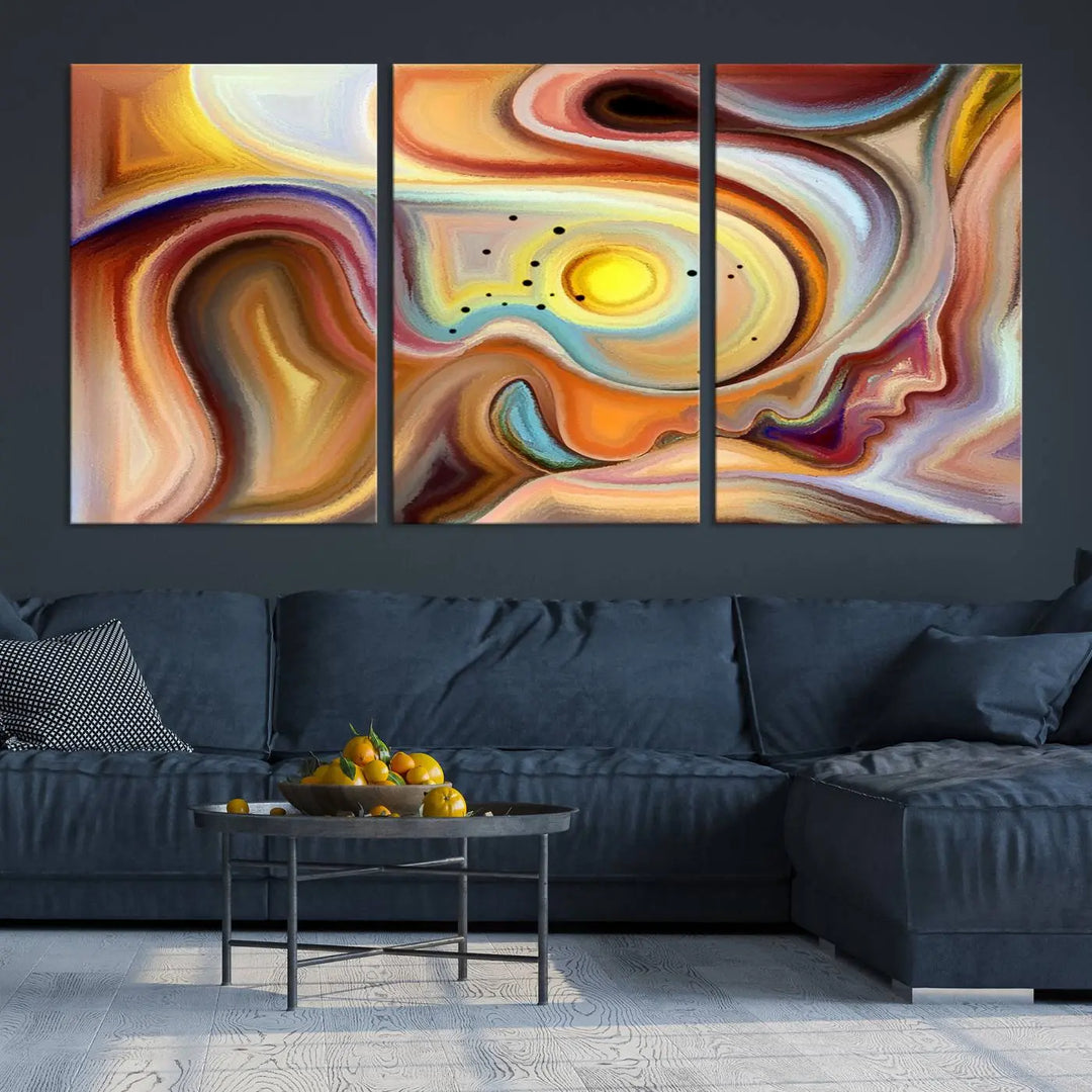 The "Colorful Abstract Human Figures Wall Art Canvas Print" features a triptych design with swirling colors in yellow, brown, and orange tones on gallery-wrapped, museum-quality canvases.