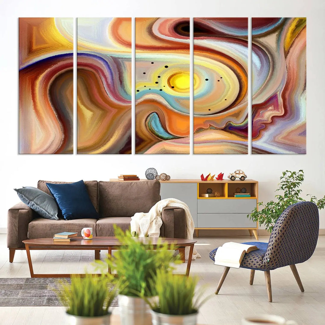 The "Colorful Abstract Human Figures Wall Art Canvas Print" features a triptych design with swirling colors in yellow, brown, and orange tones on gallery-wrapped, museum-quality canvases.