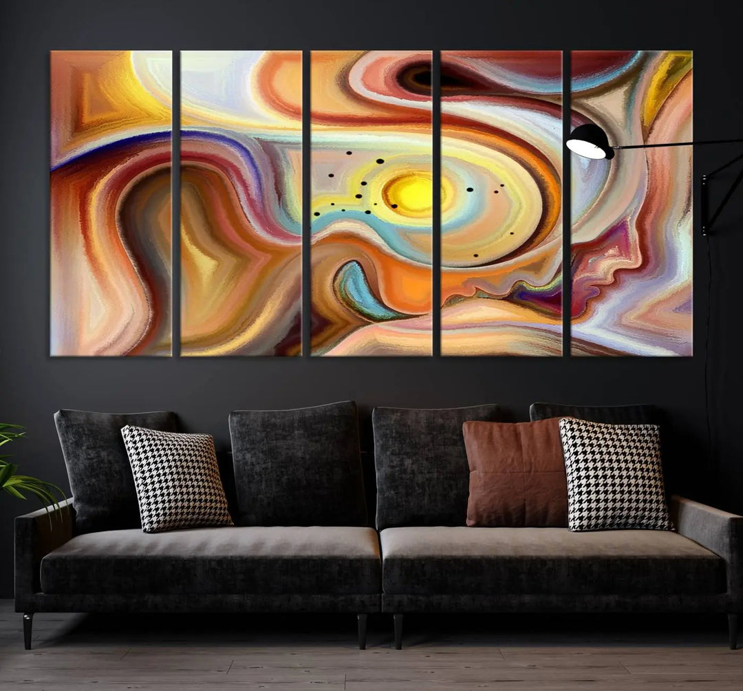 The "Colorful Abstract Human Figures Wall Art Canvas Print" features a triptych design with swirling colors in yellow, brown, and orange tones on gallery-wrapped, museum-quality canvases.