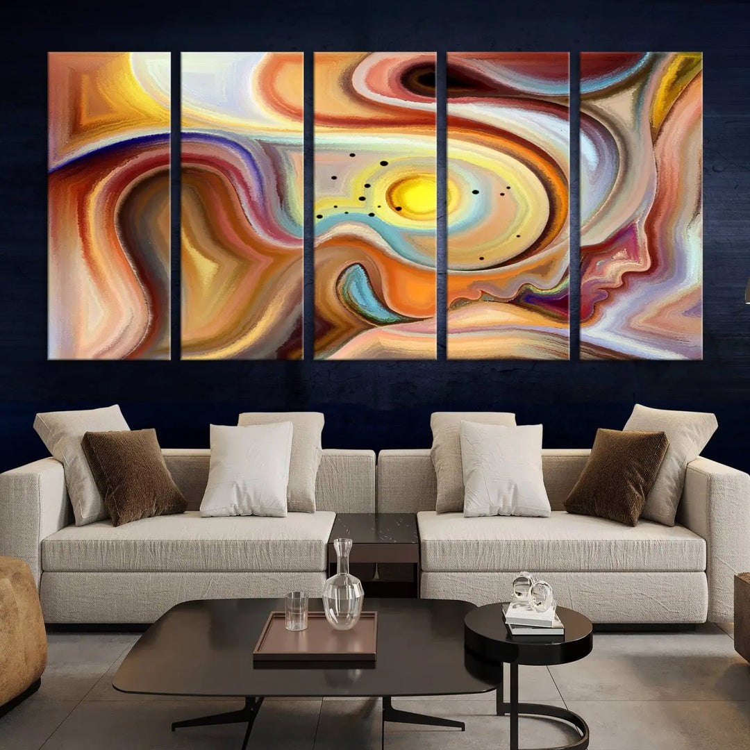 The "Colorful Abstract Human Figures Wall Art Canvas Print" features a triptych design with swirling colors in yellow, brown, and orange tones on gallery-wrapped, museum-quality canvases.