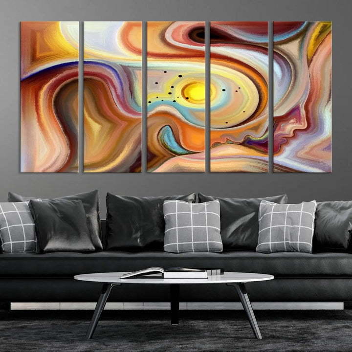 The "Colorful Abstract Human Figures Wall Art Canvas Print" features a triptych design with swirling colors in yellow, brown, and orange tones on gallery-wrapped, museum-quality canvases.