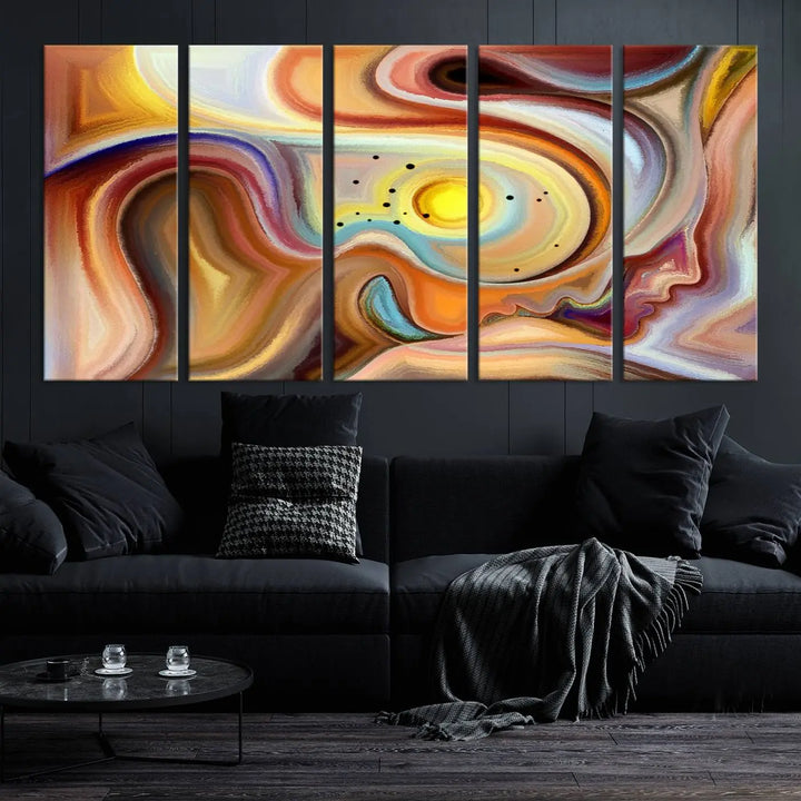 The "Colorful Abstract Human Figures Wall Art Canvas Print" features a triptych design with swirling colors in yellow, brown, and orange tones on gallery-wrapped, museum-quality canvases.