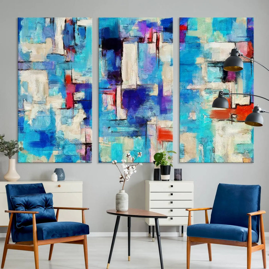 The room features a set of three "Colorful Abstract Painting Canvas Wall Art" pieces on museum-quality canvas, ready to hang.