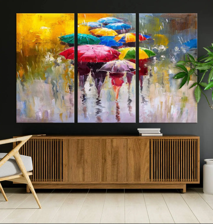 Featuring a vibrant depiction of people with umbrellas, the Colorful Canvas Painting of Umbrellas Wall Art is printed on museum-quality canvas. It arrives ready to hang and comes with a UV-protective coating to maintain its vivid colors over time.