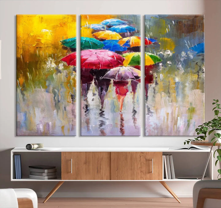 Featuring a vibrant depiction of people with umbrellas, the Colorful Canvas Painting of Umbrellas Wall Art is printed on museum-quality canvas. It arrives ready to hang and comes with a UV-protective coating to maintain its vivid colors over time.