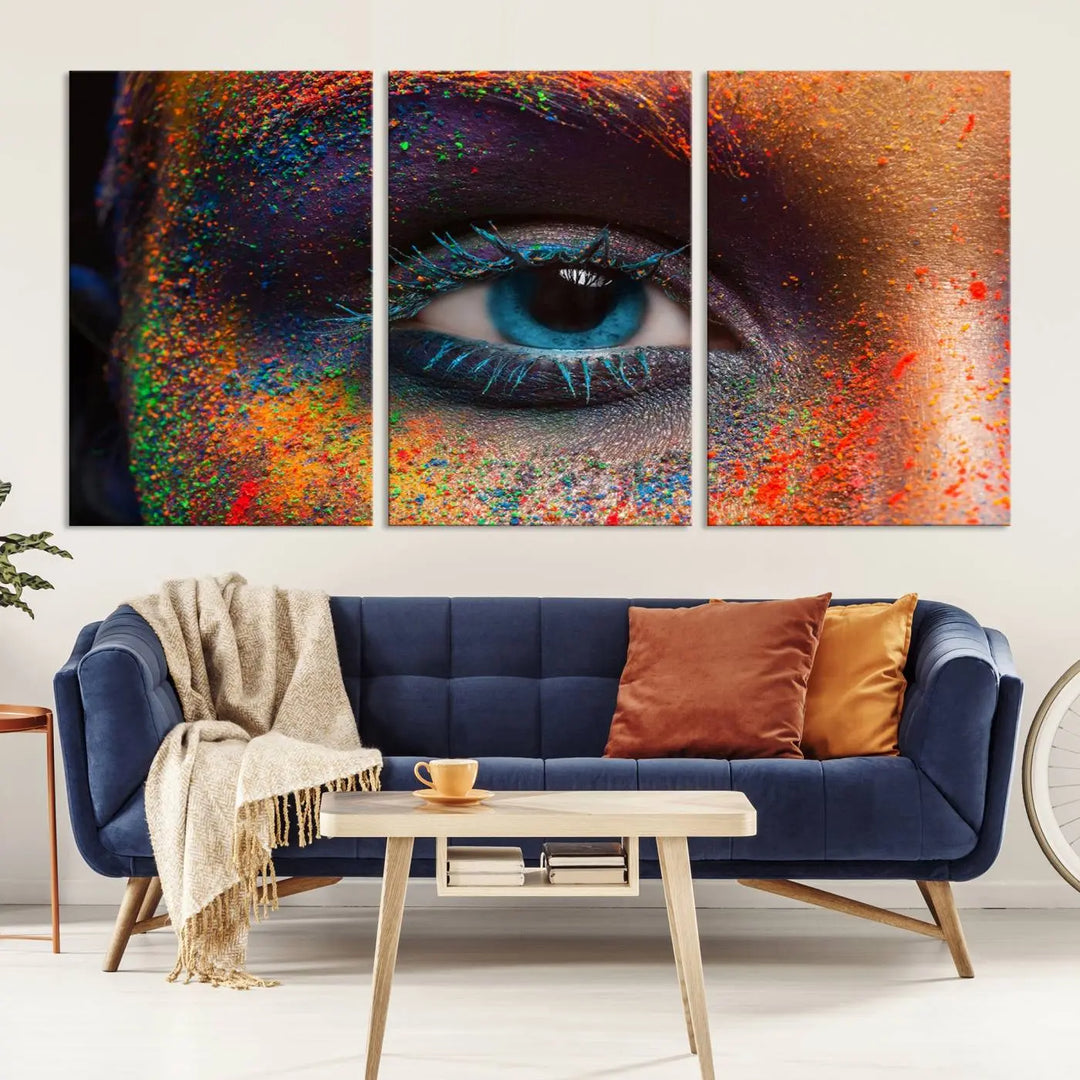 The contemporary living room is enhanced by a multi-panel canvas wall art piece titled "Colorful Eye Close Up Canvas Wall Art Print," which adds a vibrant touch to the gallery-wrapped design on the wall.