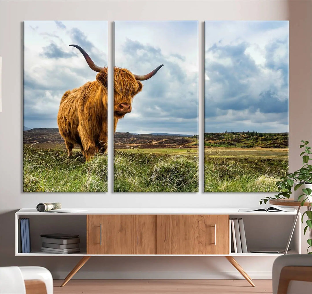 The "Colorful Highland Cow Canvas Art Print Multi Panel Wall Art Animal Picture Canvas" showcases a highland cow set in a picturesque landscape across three panels, printed on museum-quality canvases.