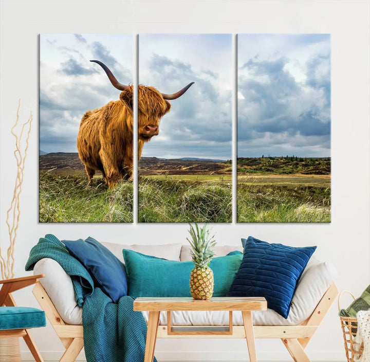 The "Colorful Highland Cow Canvas Art Print Multi Panel Wall Art Animal Picture Canvas" showcases a highland cow set in a picturesque landscape across three panels, printed on museum-quality canvases.