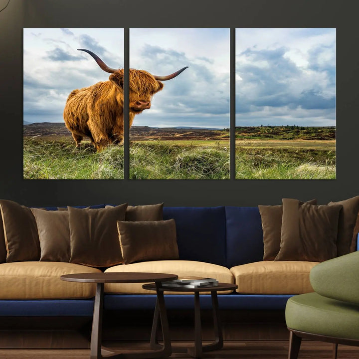 The "Colorful Highland Cow Canvas Art Print Multi Panel Wall Art Animal Picture Canvas" showcases a highland cow set in a picturesque landscape across three panels, printed on museum-quality canvases.