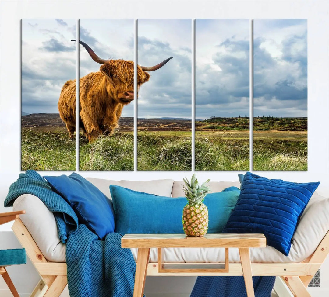 The "Colorful Highland Cow Canvas Art Print Multi Panel Wall Art Animal Picture Canvas" showcases a highland cow set in a picturesque landscape across three panels, printed on museum-quality canvases.