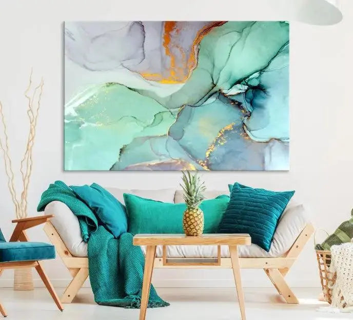 Contemporary living room featuring the Colorful Marble Fluid Effect Wall Art Abstract Canvas Wall Art Print, showcasing multi-panel abstract designs in teal, gold, and white tones. This museum-quality canvas artwork is ready to hang and finished with a UV-protective coating for enduring vibrancy.