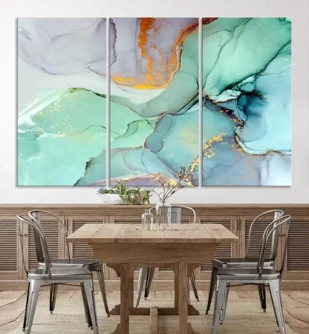 Contemporary living room featuring the Colorful Marble Fluid Effect Wall Art Abstract Canvas Wall Art Print, showcasing multi-panel abstract designs in teal, gold, and white tones. This museum-quality canvas artwork is ready to hang and finished with a UV-protective coating for enduring vibrancy.