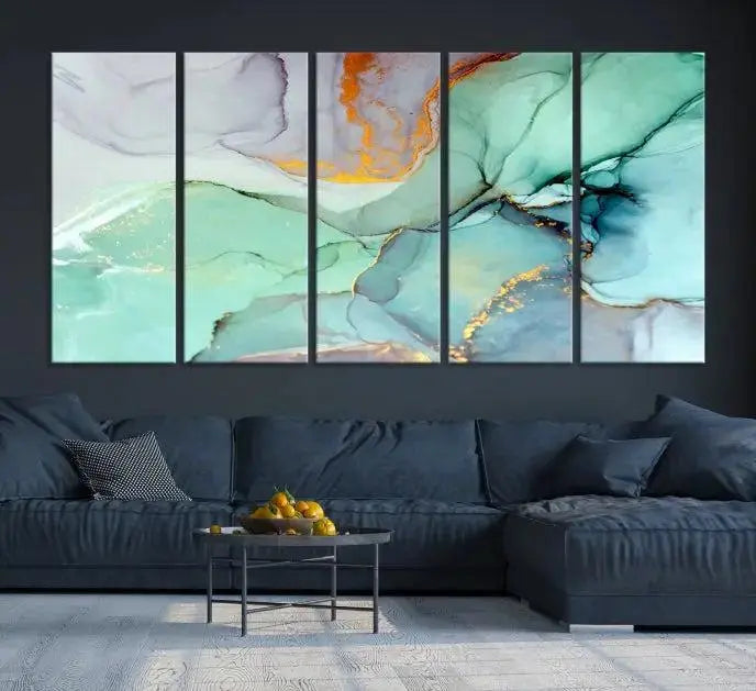 Contemporary living room featuring the Colorful Marble Fluid Effect Wall Art Abstract Canvas Wall Art Print, showcasing multi-panel abstract designs in teal, gold, and white tones. This museum-quality canvas artwork is ready to hang and finished with a UV-protective coating for enduring vibrancy.