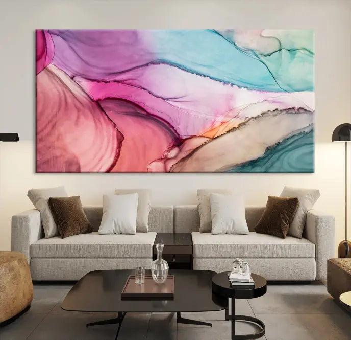 A set of Colorful Marble Fluid Effect Wall Art Abstract Canvas Wall Art Prints showcases pink, blue, and beige swirls. These gallery-wrapped canvases boast museum-quality finesse with a UV-protective coating for enduring vibrancy.