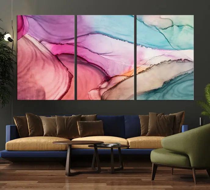 A set of Colorful Marble Fluid Effect Wall Art Abstract Canvas Wall Art Prints showcases pink, blue, and beige swirls. These gallery-wrapped canvases boast museum-quality finesse with a UV-protective coating for enduring vibrancy.