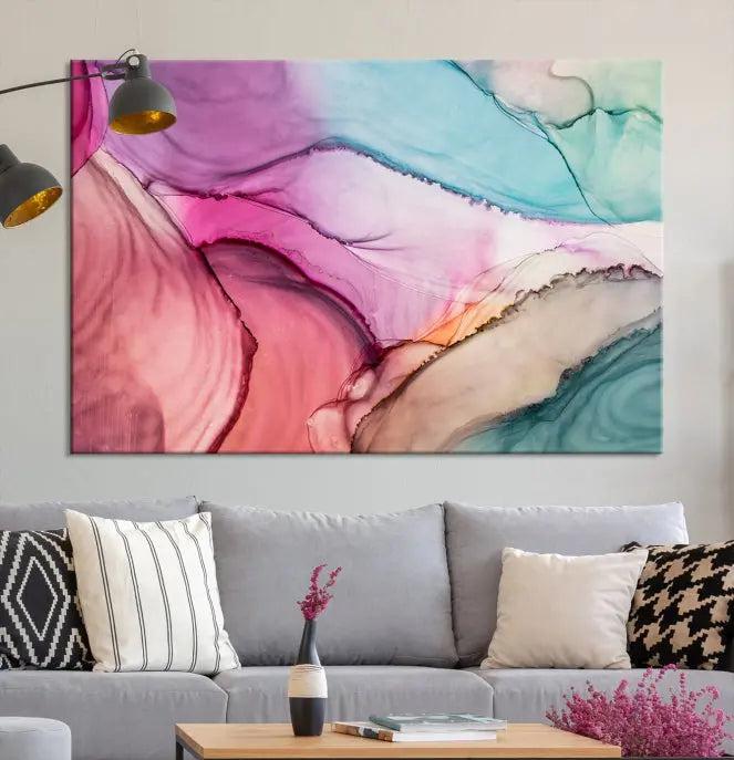 A modern living room showcases a "Colorful Marble Fluid Effect Wall Art" abstract canvas print on a gallery-wrapped, museum-quality canvas.