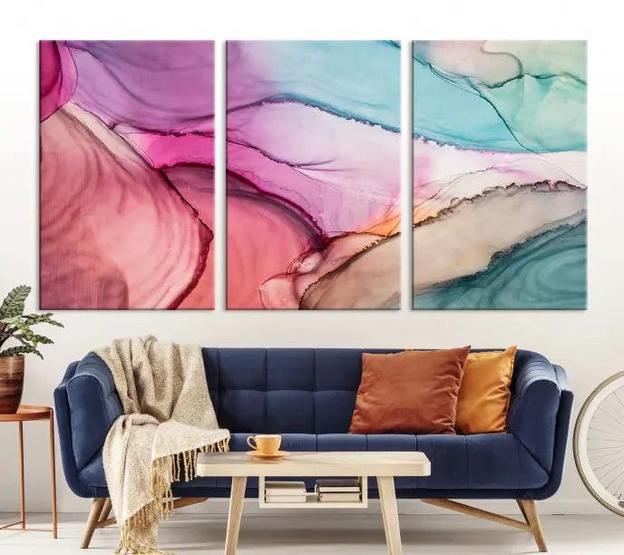 A modern living room showcases a "Colorful Marble Fluid Effect Wall Art" abstract canvas print on a gallery-wrapped, museum-quality canvas.