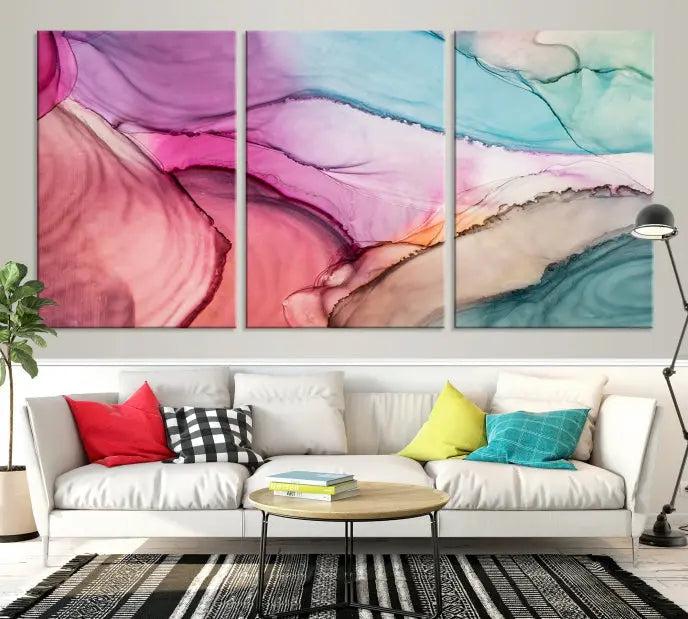 A modern living room showcases a "Colorful Marble Fluid Effect Wall Art" abstract canvas print on a gallery-wrapped, museum-quality canvas.