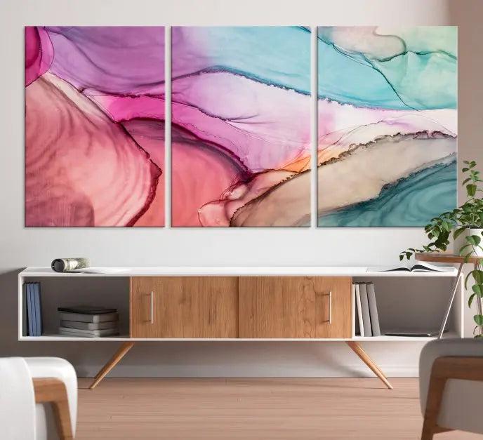 A modern living room showcases a "Colorful Marble Fluid Effect Wall Art" abstract canvas print on a gallery-wrapped, museum-quality canvas.