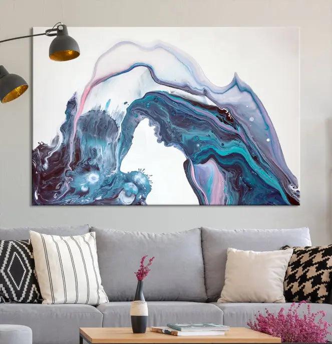 A stunning triptych of the "Colorful Marble Fluid Effect Wall Art Abstract Canvas Wall Art Print" in blue and purple hues hangs prominently in this modern living room.