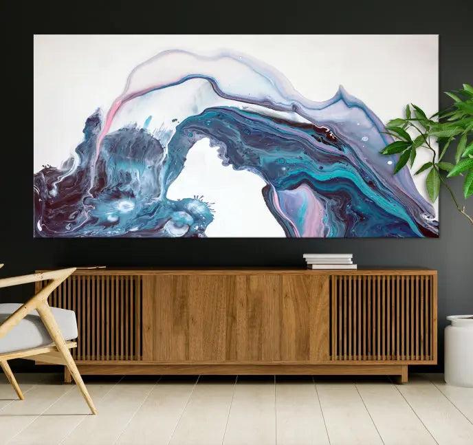 A stunning triptych of the "Colorful Marble Fluid Effect Wall Art Abstract Canvas Wall Art Print" in blue and purple hues hangs prominently in this modern living room.