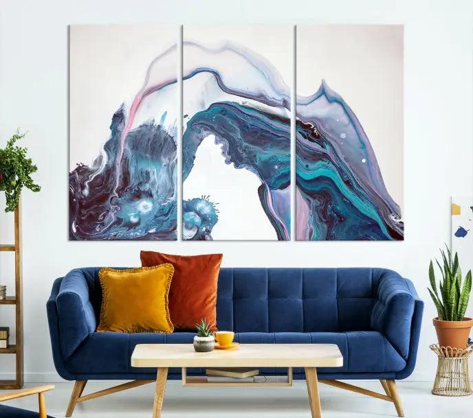 A stunning triptych of the "Colorful Marble Fluid Effect Wall Art Abstract Canvas Wall Art Print" in blue and purple hues hangs prominently in this modern living room.