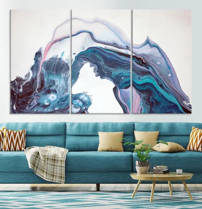 A stunning triptych of the "Colorful Marble Fluid Effect Wall Art Abstract Canvas Wall Art Print" in blue and purple hues hangs prominently in this modern living room.